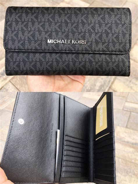 michael kors black wallet with lock|Michael Kors black wallet sale.